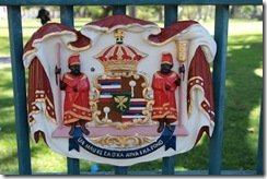 The emblem on the gate in front of Iolani Palace in Oahu